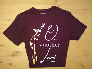 Moko Jumbie Tee - On Another Level - Sorrel